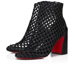 Christian Louboutin black heels. Never worn. Paid $1795. Size 37.5 with box.